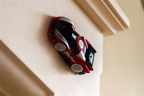 Toy car that climbs walls - Wall Climbing Remote Control Car Rc Cars,360°Rotating Stunt Toy Car,Latest Headlights and Taillight Rechargeable High Speed Cool Toys for Boy Girl Kids Toddlers Birthday Gifts (red) $36.99 $ 36 . 99 FREE delivery
